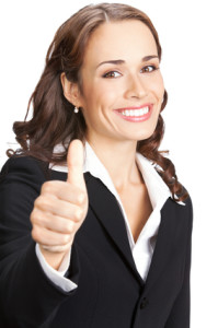 Businesswoman with thumbs up, on white